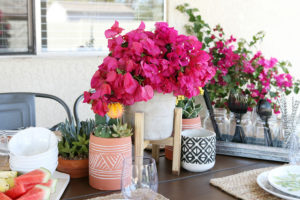 Mix and match pottery and succulents for a quick and easy centerpiece.