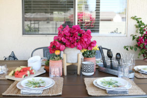 Modern farmhouse mixed with texture and color for a simple and easy outdoor entertaining set up.