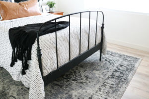 Black & White Boho Inspired Bedroom with Distressed Medallion Rug