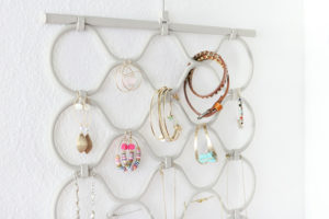 Easy Organization Idea - Use a scarf hanger as a jewelry organizer