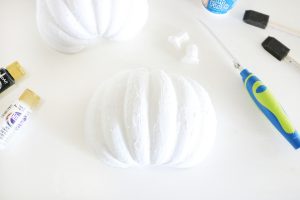 DIY Faux Pumpkin Wall Decor - Coat Foam Pumpkins with Smooth Finish and Sand Smooth for a Chalky Plaster Like Finish.