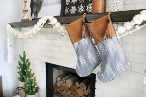 Casual Boho Christmas Decor - Faux leather and boho inspired fabric stockings.