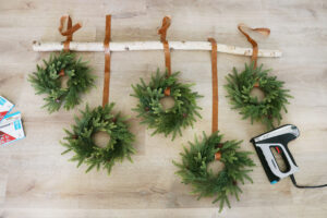 Hang Simple Holiday Wreaths for a Modern Christmas Wall Hanging